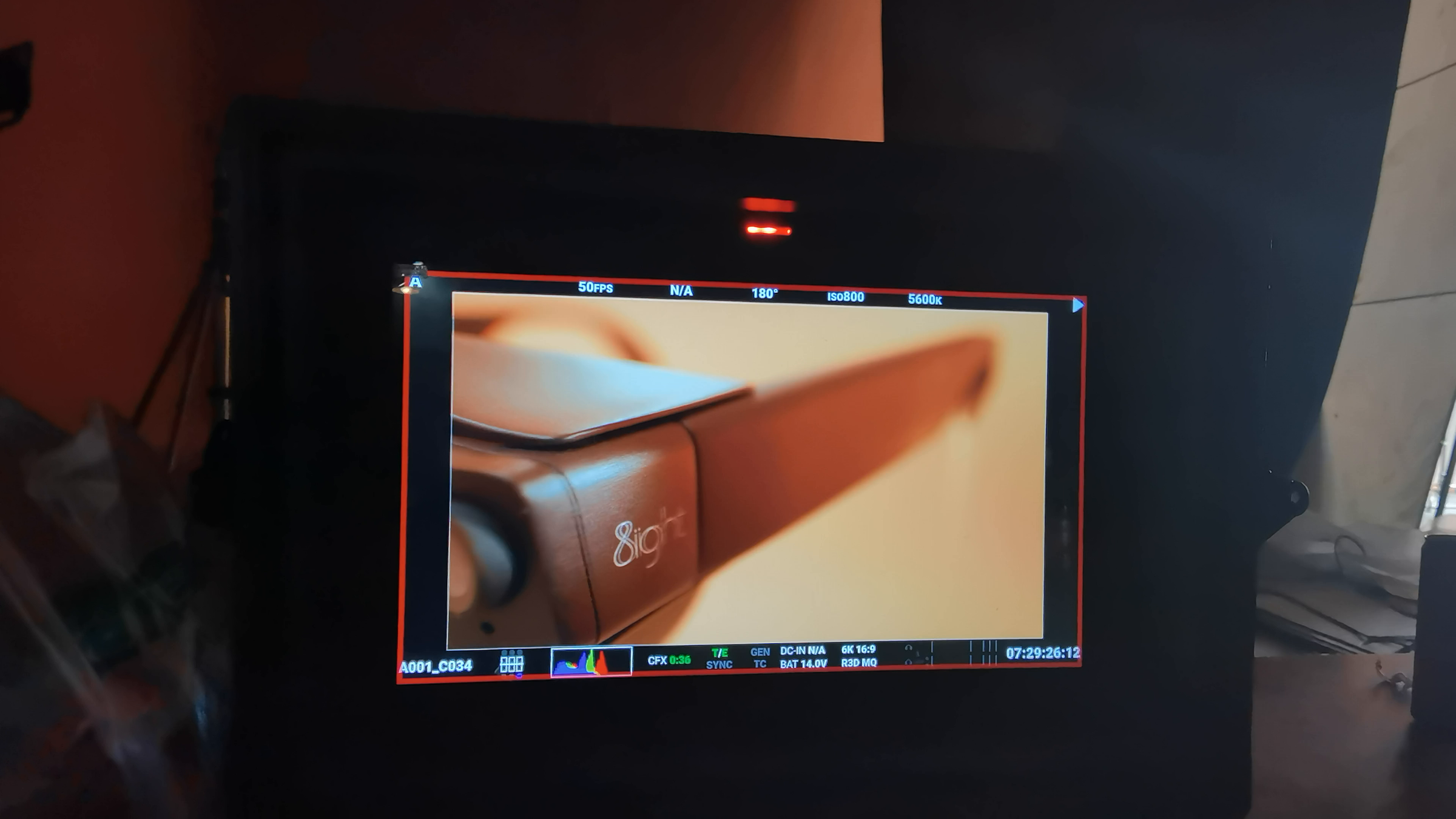 Production monitor showing the 8ight wordmark on the camera-glasses temple