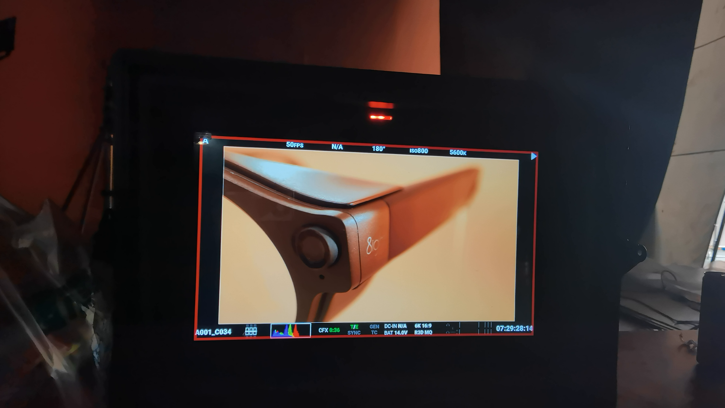 Close production view of the camera-glasses side housing, hinge, and 8ight logo