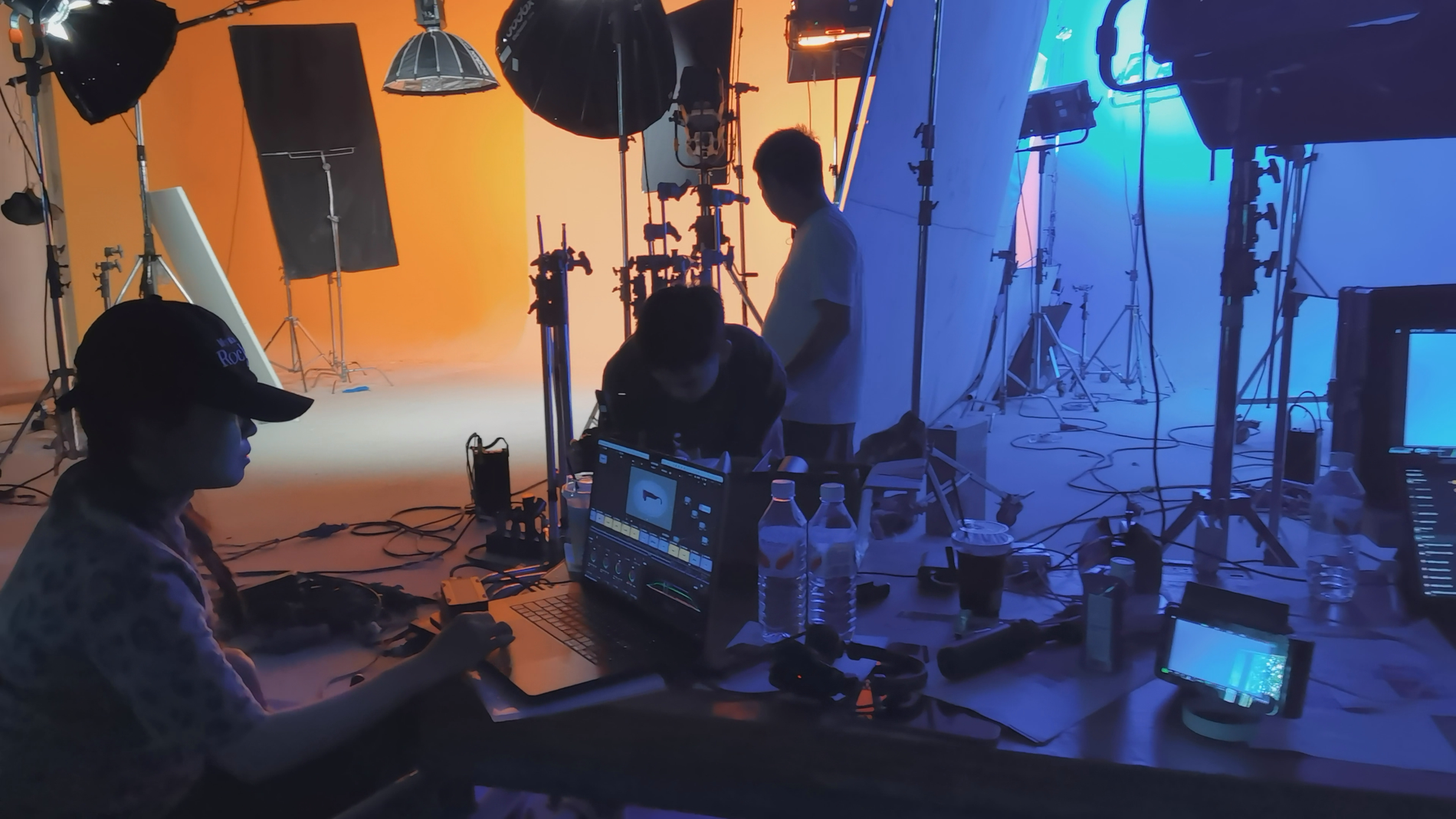 Production control desk with orange and blue lighting