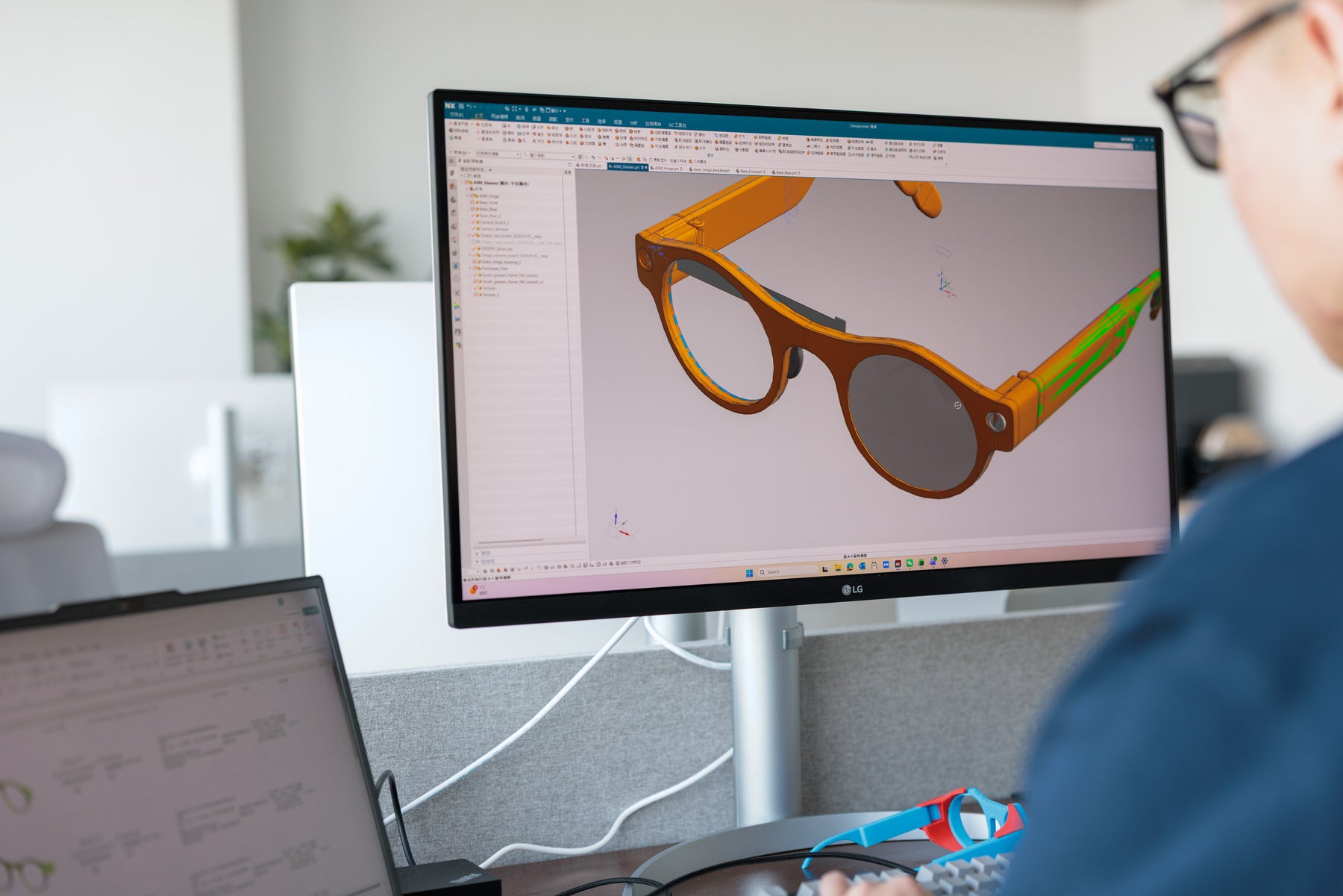 Detailed 8ight smart glasses CAD model displayed on an engineering monitor
